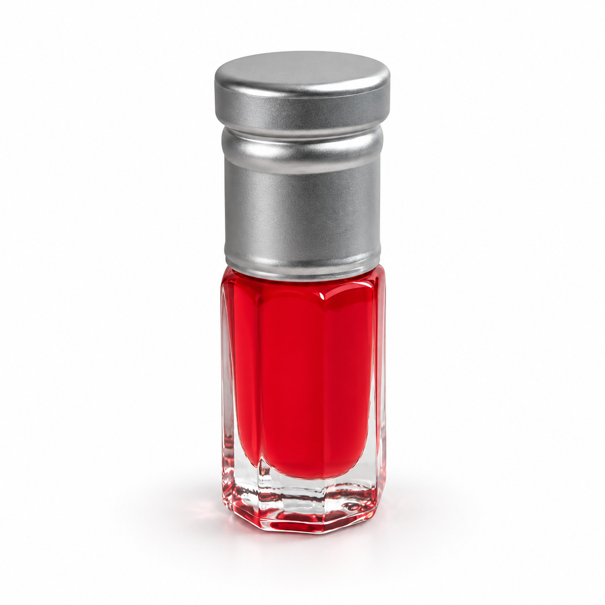 Pom Peach Mix 1/4 Tola musk in a clear glass bottle with red liquid and a silver cap on a white background