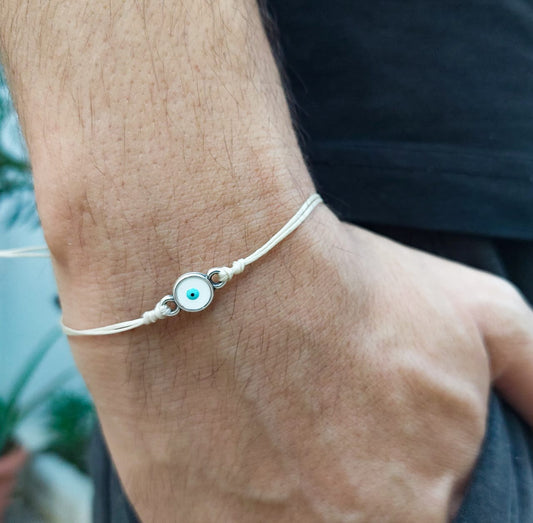 BEIGE THREAD WITH WHITE-SILVER EVIL EYE BRACELET