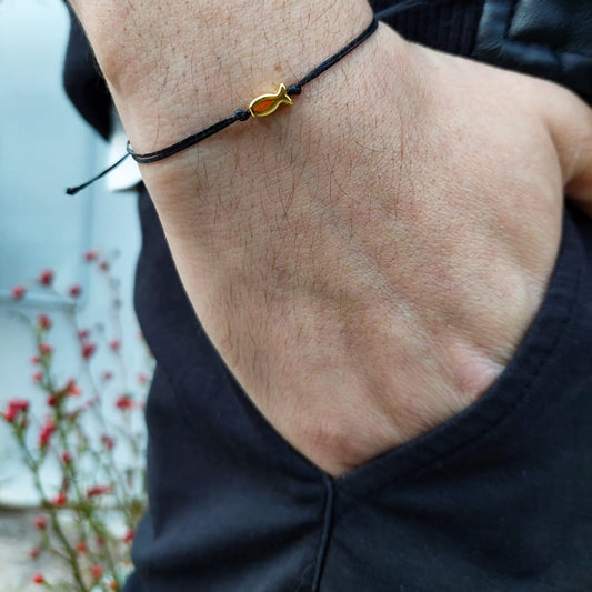BLACK THREAD WITH GOLD FISH BRACELET