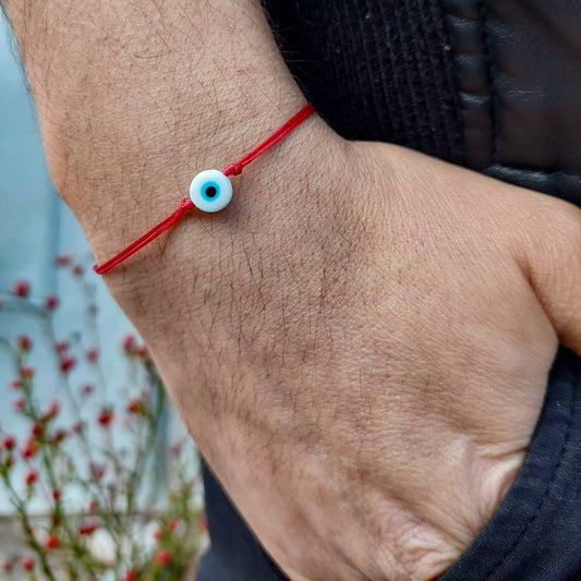 RED THREAD WITH WHITE EVIL EYE BRACELET