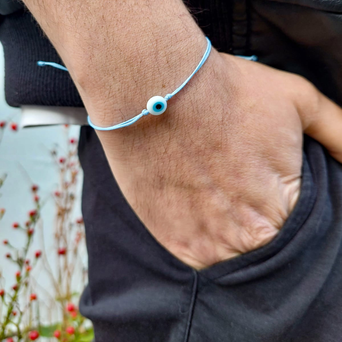 BABY BLUE THREAD WITH WHITE EVIL EYE BRACELET