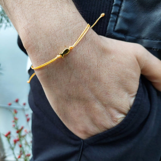 ORANGE THREAD WITH GOLD FISH BRACELET