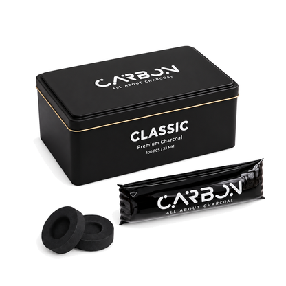Carbon CLASSIC charcoal tin, sleeve and charcoal pieces on a pure white background