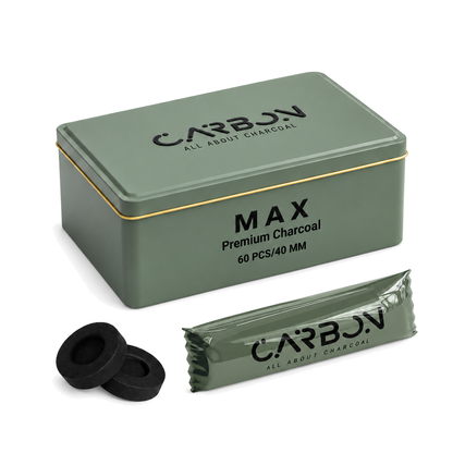 Carbon MAX charcoal tin, sleeve and charcoal pieces on a pure white background
