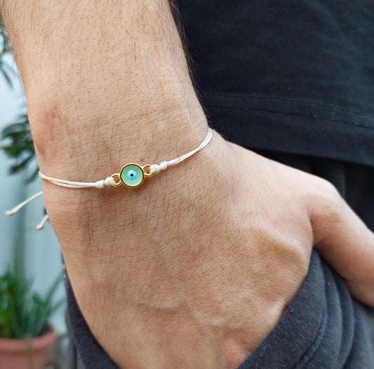 BEIGE THREAD WITH MINT-GOLD EVIL EYE BRACELET